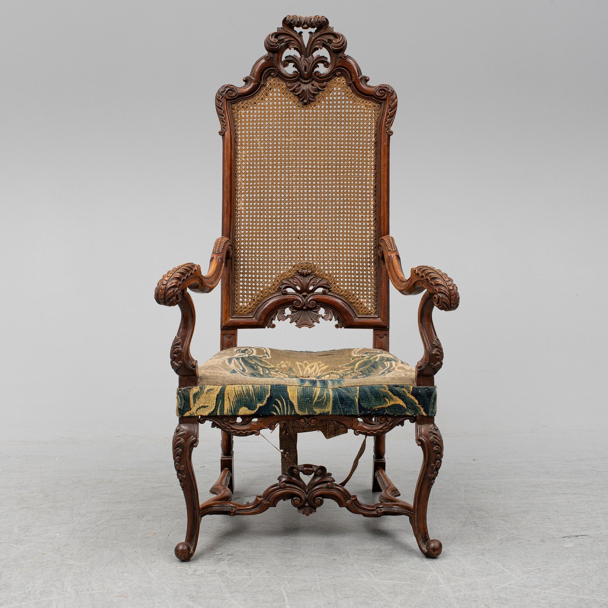 A 19th century baroque style armchair.