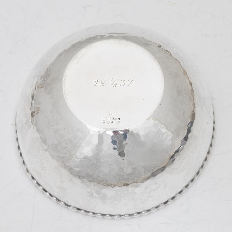 A pair of Swedish silver candlesticks, and a bowl, 1930s–60s.