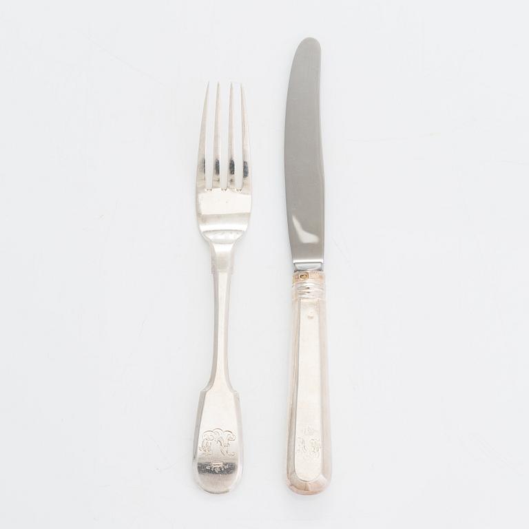 A 24-piece set of silver cutlery, Saint Petersburg 1870. Maker's mark A.K.