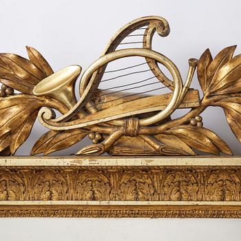 A two-branch Empire giltwood girandole mirror by P. G. Bylander (master in Gothenburg 1811-58).