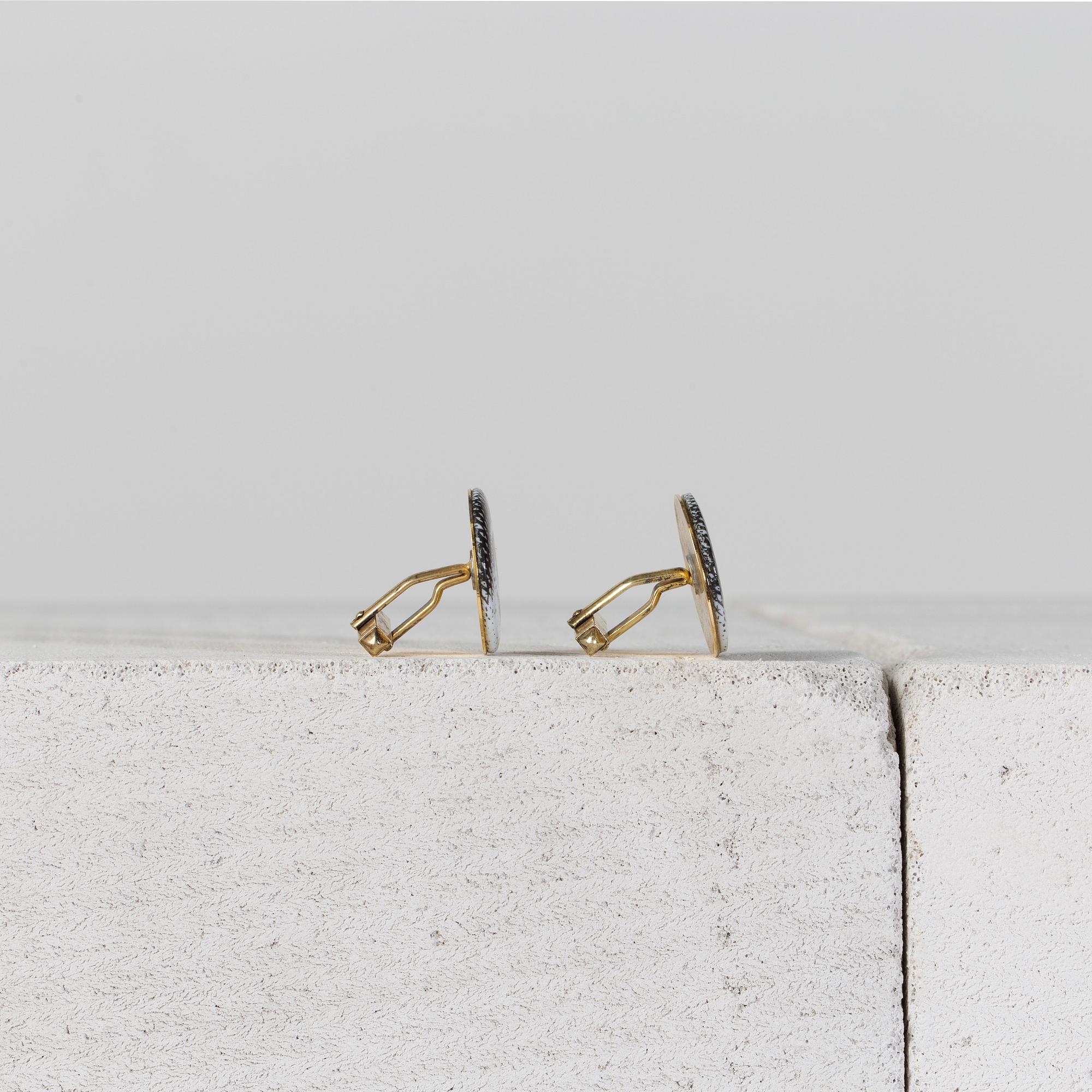 MANSCHETTKNAPPAR, ett par, Fornasetti.