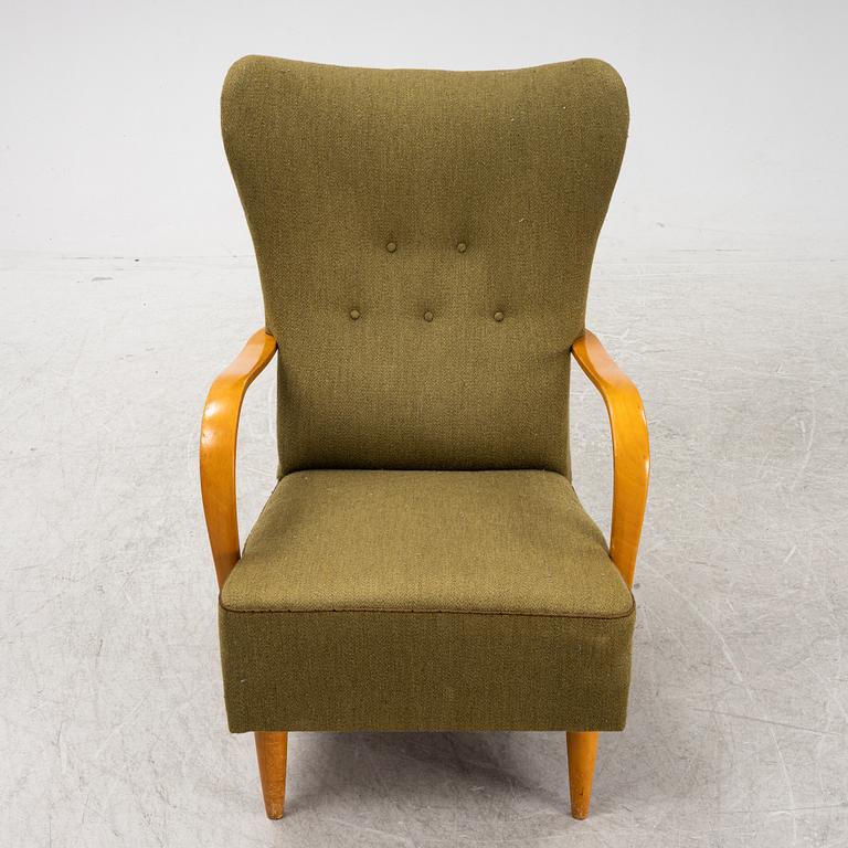 A 1940's wingback armchair.