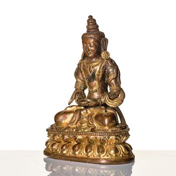 A gilt copper alloy figure of Amitayus, Tibeto-Chinese/Mongolia, 18th century.