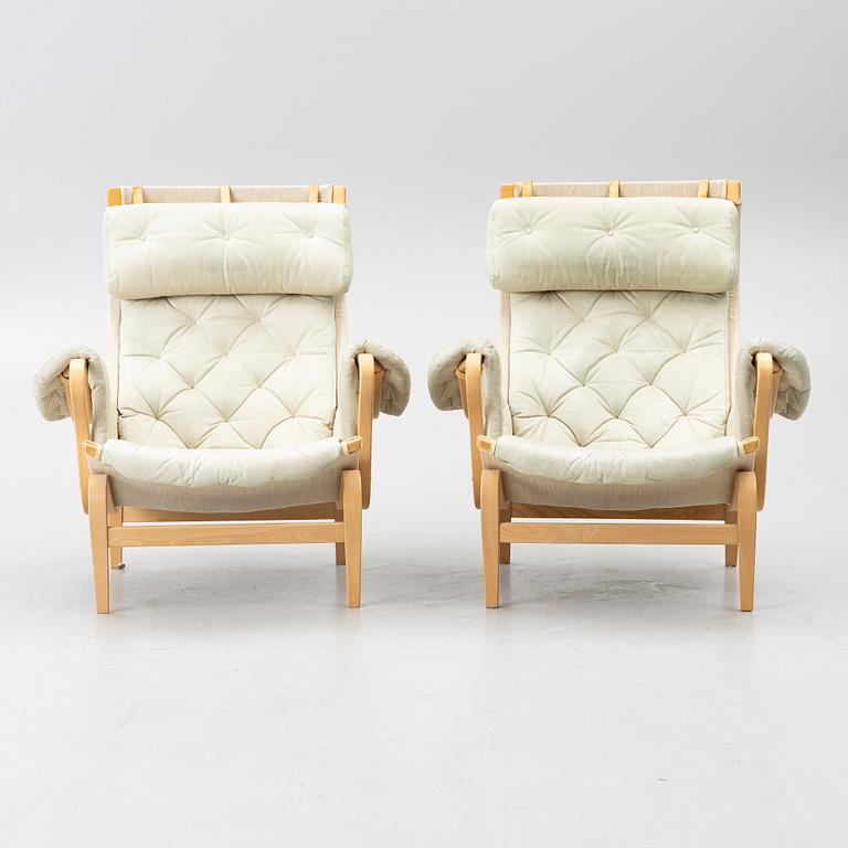 Bruno Mathsson, a pair of 'Pernilla' armchairs, Dux, Sweden, later part of the 20th century.