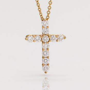 Tiffany & Co, an 18K gold cross pendant necklace with diamonds, ca. 0.42 ct in total.