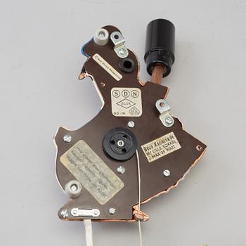 A mid 20th century metal Donald Duck Walt Disney Productions wall light.