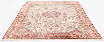 A mid 20th century central persian silk Qum carpet, c. 320 x 212 cm.