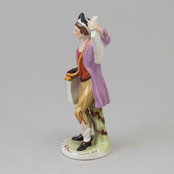 A Ludwigsburg porcelain figure of a street vendor, Germany, 1970's.
