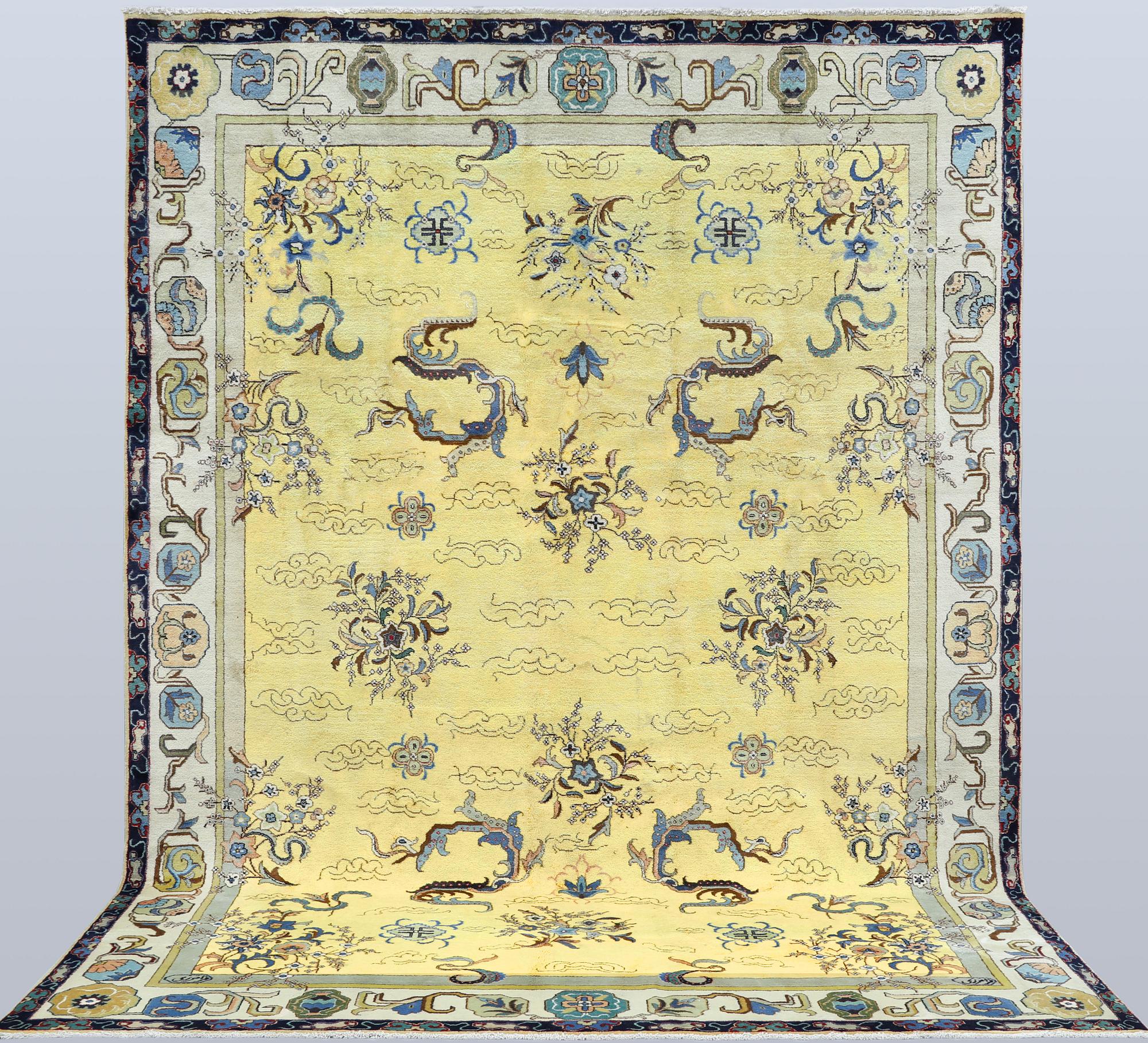 A Tabriz carpet, signed, approx. 388 x 280 cm.