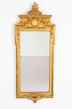 A Gustavian giltwood mirror by N. Meunier (master in Stockholm 1754-97, supplier to the royal court 1769).