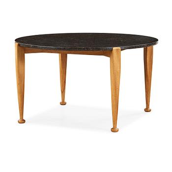 420. Josef Frank, a black marble top table, model 960, walnut base, Svenskt Tenn, 1950's.