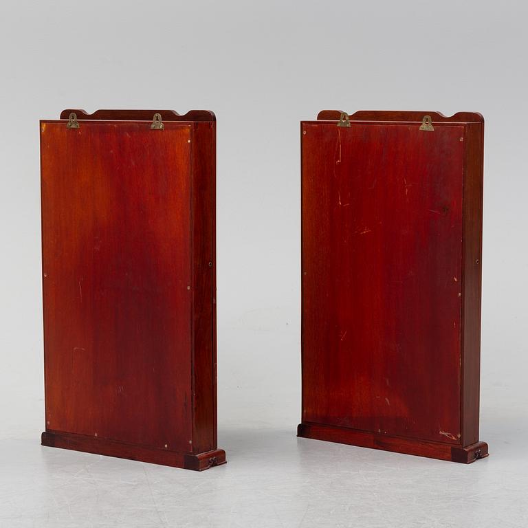 A pair of chinese wall cabinets, 20th century.