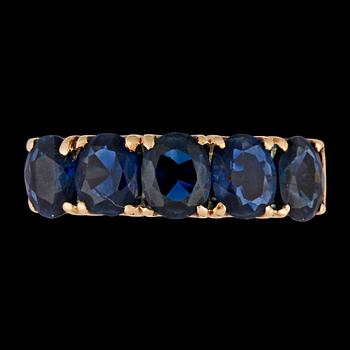 3. A five stonen blue sapphire ring.