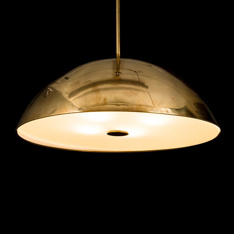 A mid 20th century pendant light for Taito Finland.