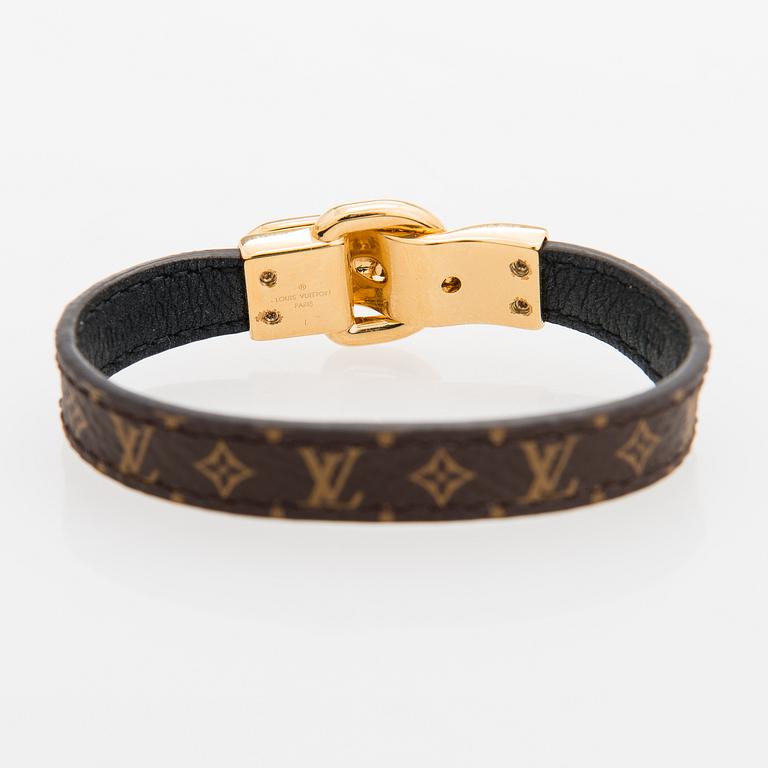 Louis Vuitton, "Fasten your LV" bracelet. Marked Louis Vuitton Paris, Made in Spain.