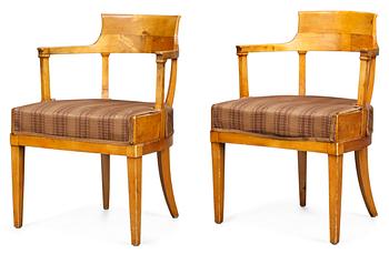 A pair of Swedish Empire armchairs.