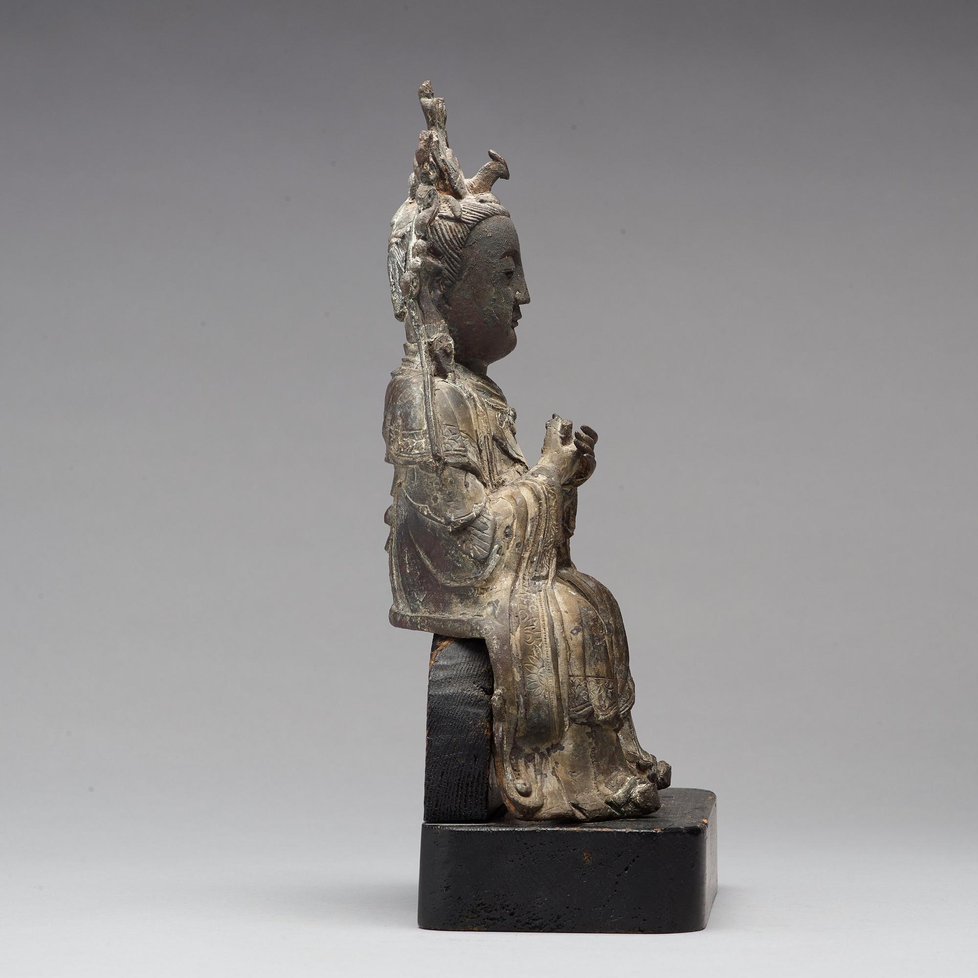 A bronze figure of Guanyin, Ming dynasty (1368-1644).