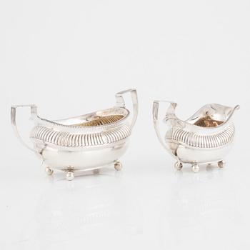 An English silver sugarbowl and a creamer, mark of Charles Fox I, London, England 1813.