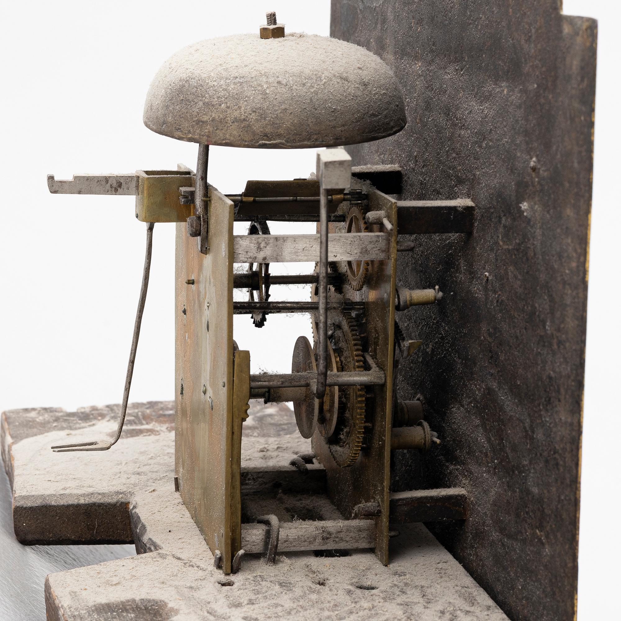 A longcase clock by W. Barrow (watchmaker in London 1700-36).