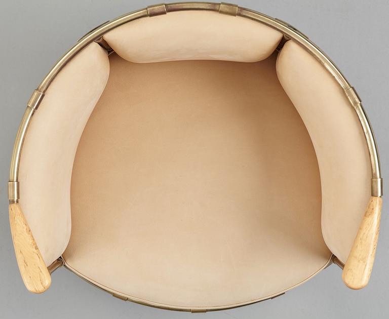 Mats Theselius, a brass "El Dorado" chair, Källemo Sweden post 2002.