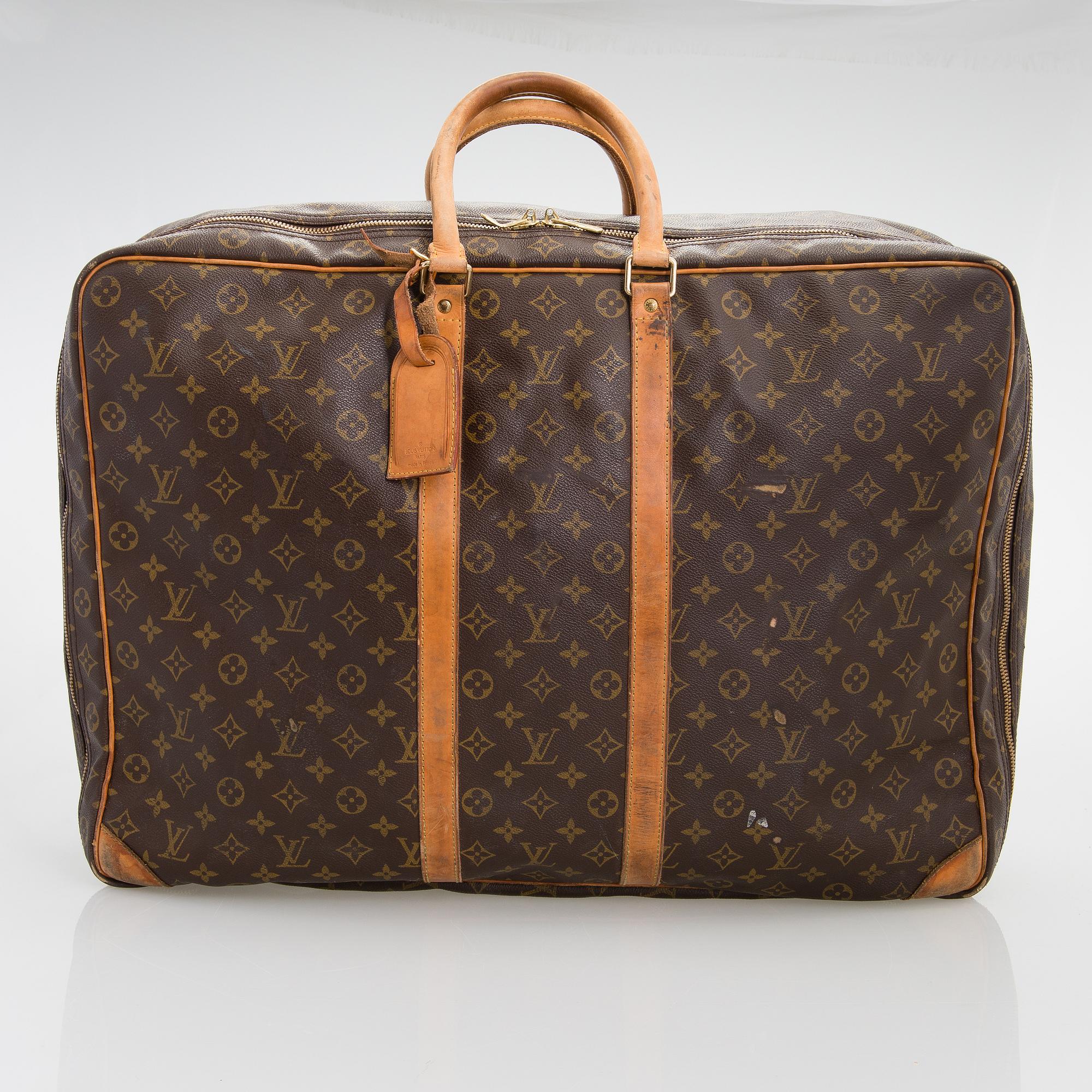 LOUIS VUITTON, Monogram Canvas Sirius Suitcase.