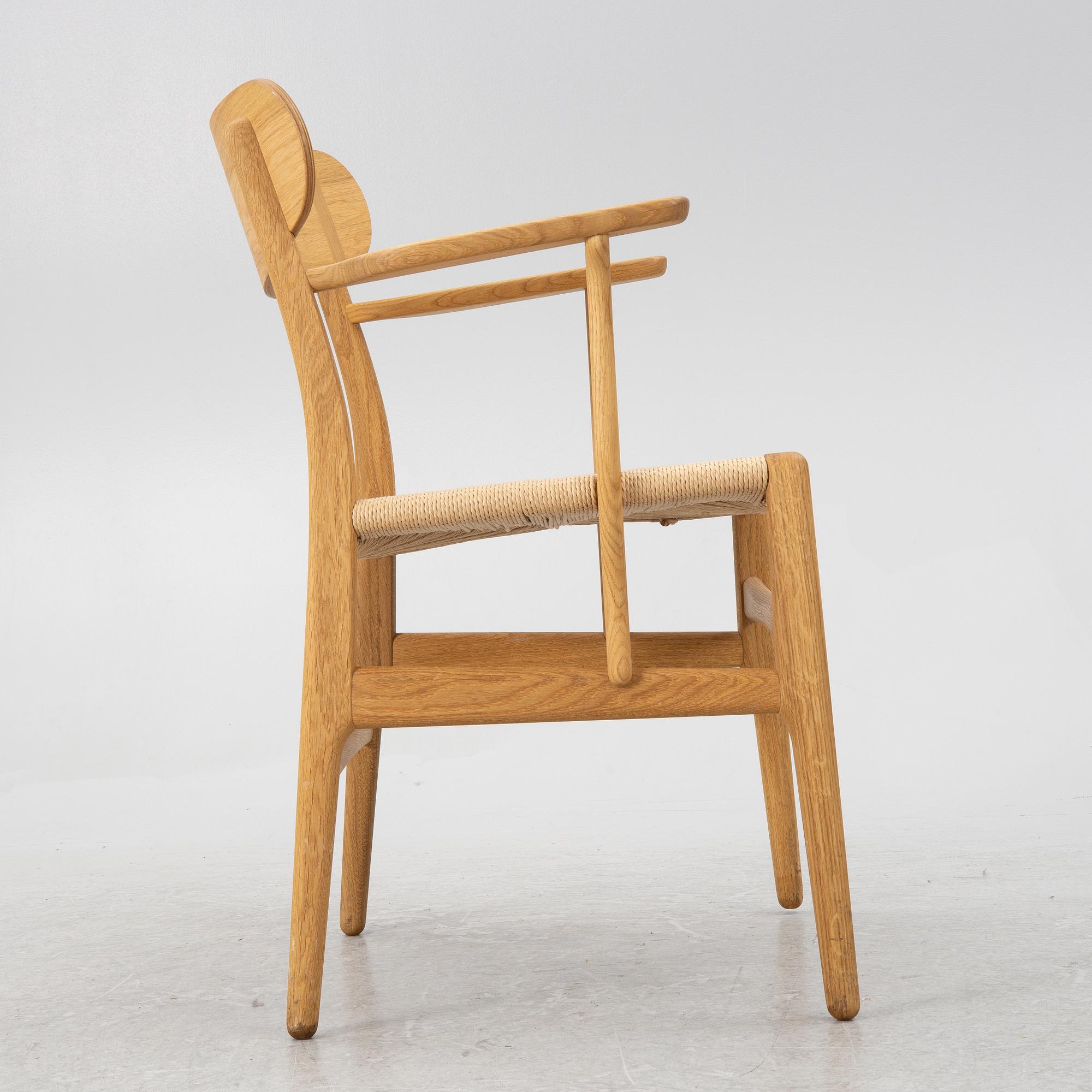 Hans J. Wegner, a CH26 chair, Carl Hansen & Son, Denmark, 21st century.