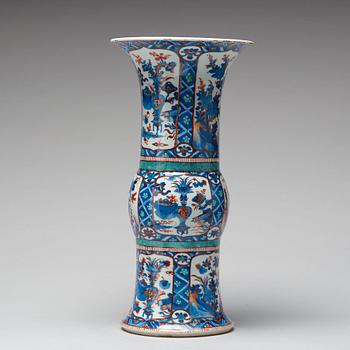 A blue and white 'Clobbered' vase, Qing dynasty, Kangxi (1662-1722).