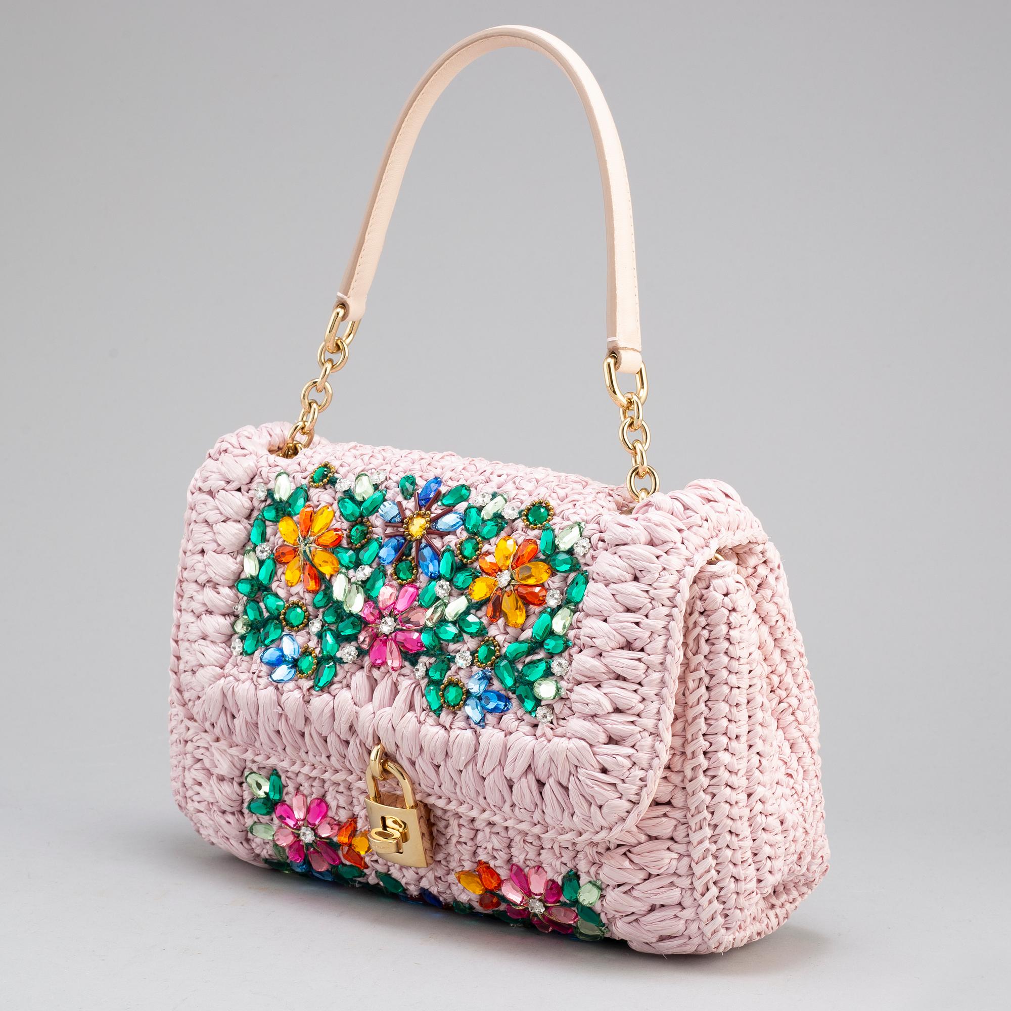 DOLCE & GABBANA, a 'Miss Bonita Satchel' embellished straw bag.