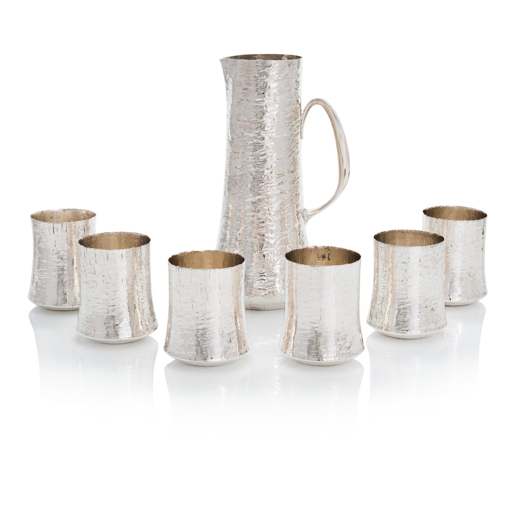 Tapio Wirkkala, a silver pitcher with six silver beakers, marked TW, Kultakeskus, Hämeenlinna Finland 1973 and 1966.