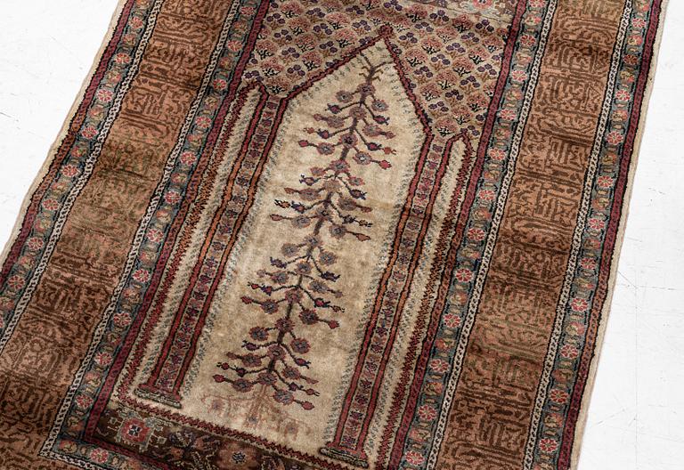 A Kaiseri prayer rug, c. 135 x 90 cm.