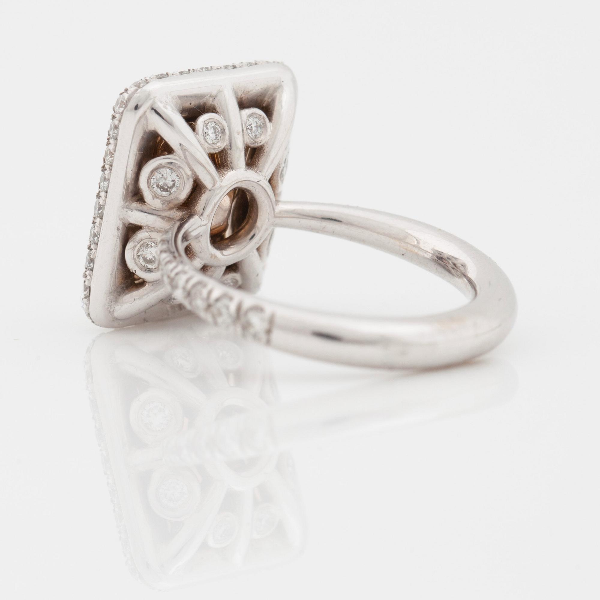 A 3.02 ct radiant-cut Fancy Yellow/VVS2 ring. Certificate from HRD.