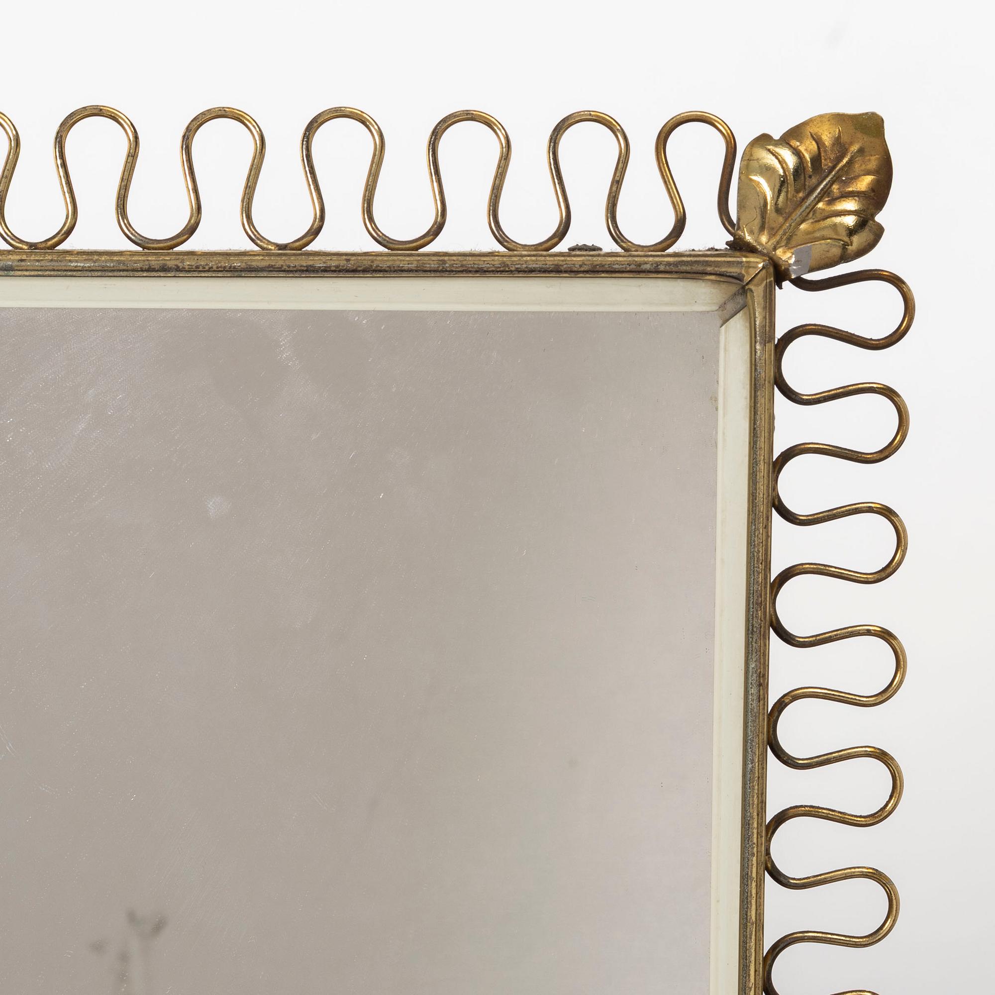 A mirror, mid-20th Century.