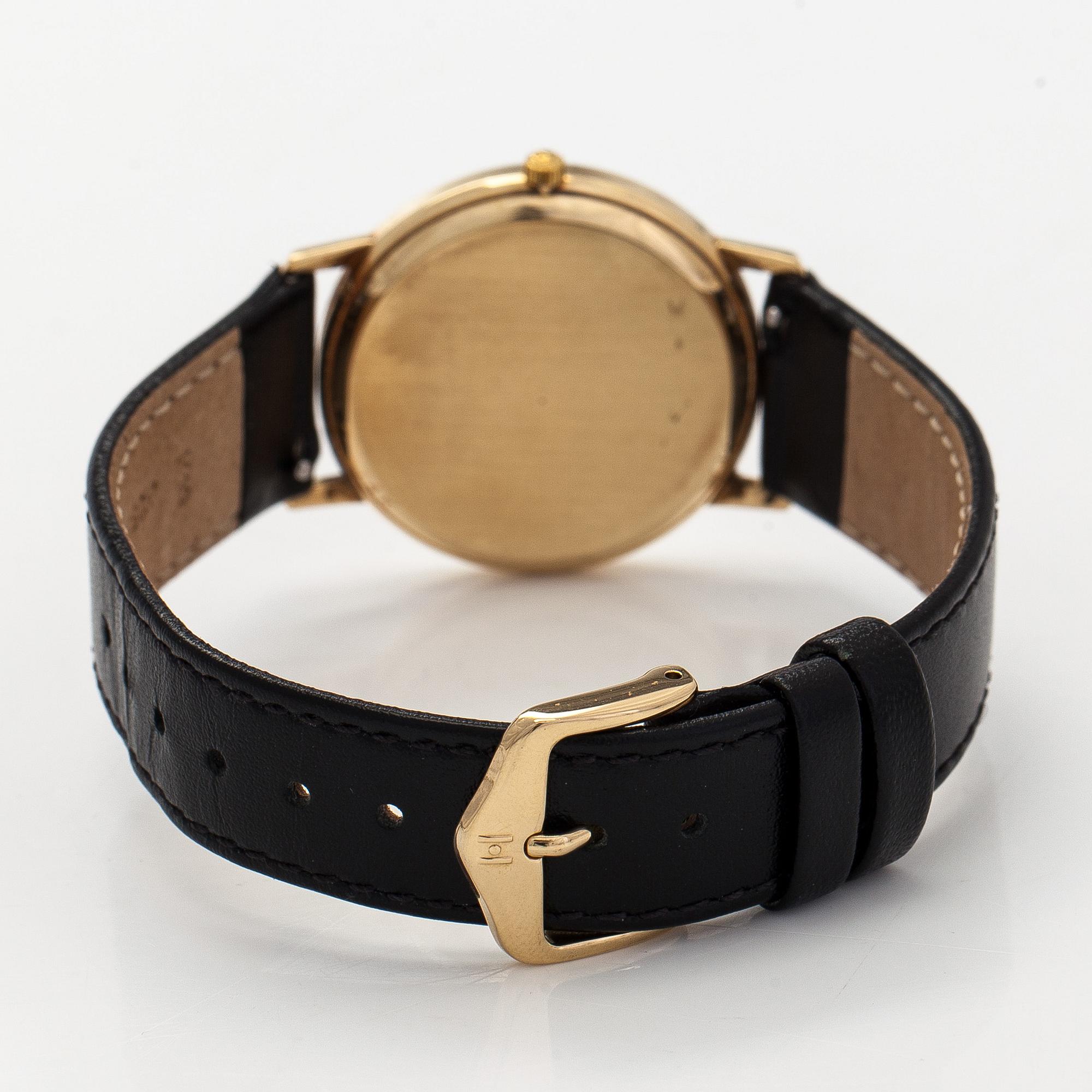 Tissot, wristwatch, 33.5 mm, 14K gold, quartz, sapphire crystal.