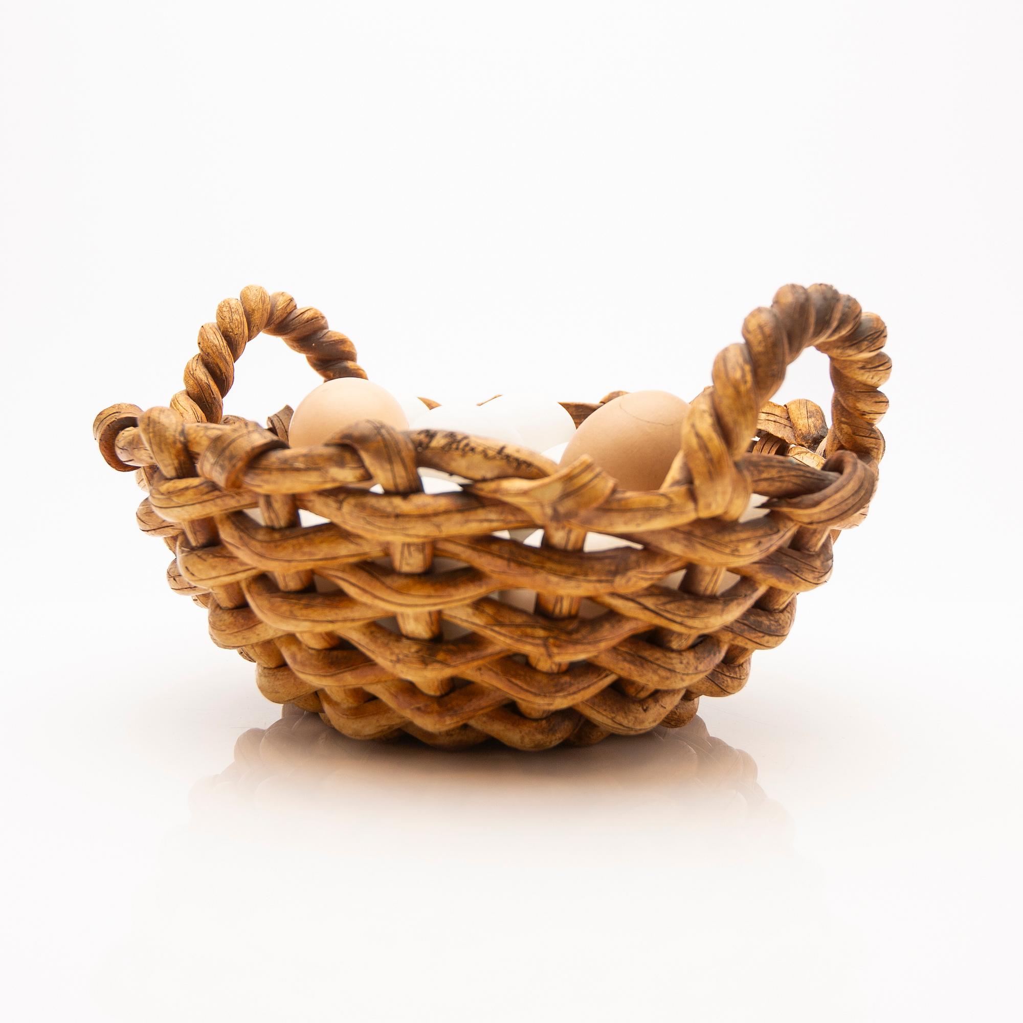 Ingrid Herrlin, basket with eggs, stoneware.