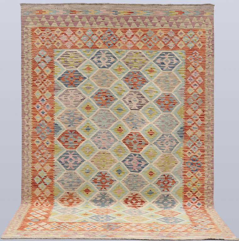 A Kilim carpet, approx. 309 x 203 cm.