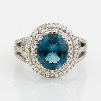 Topaz and brilliant cut diamond ring.