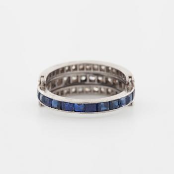 A square cut sapphire and single cut diamond ring.