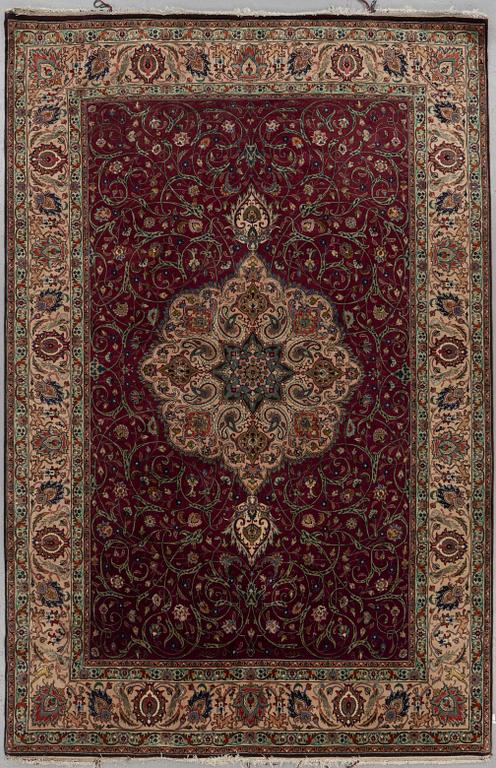 A carpet, Old Tabis, Part silk, ca 292 x 190 cm.