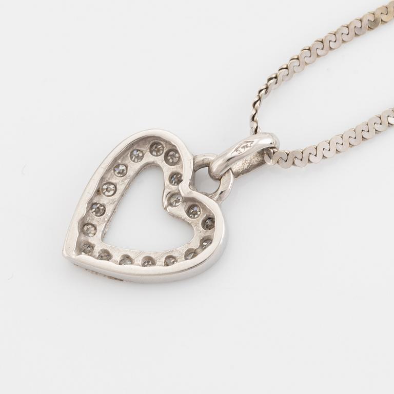 Eight cut diamond heart necklace.