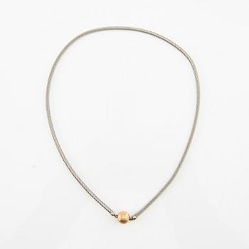 Ole Lynggaard, lås 18K guld med collier i silver.