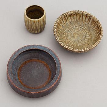 Gunnar Nylund, a set of two stoneware ashtrays, three bowls, a jug and a vase, Rörstrand.