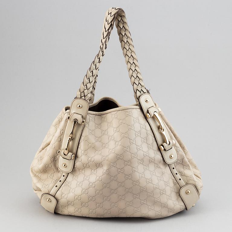 Gucci, leather bag.