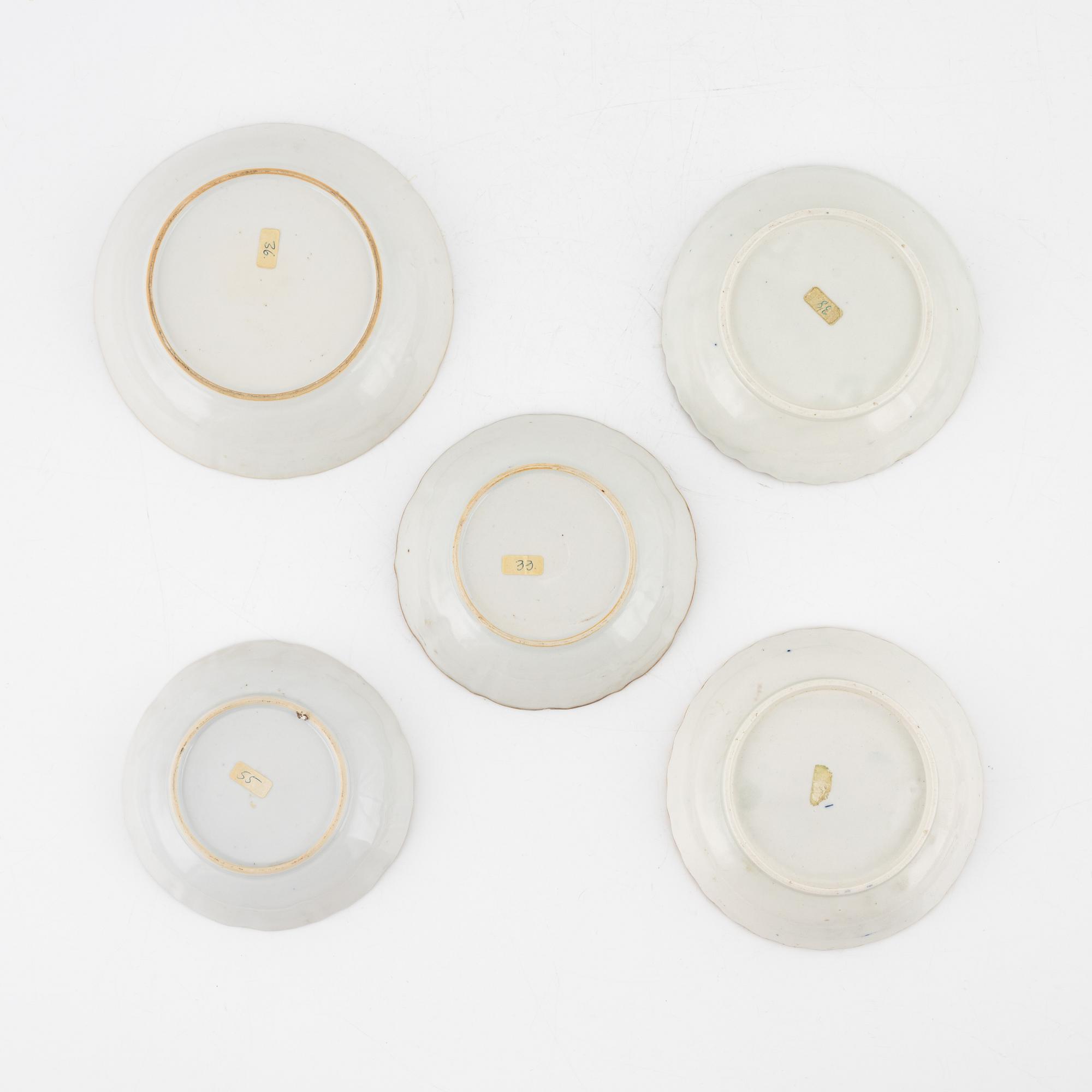 Two Chinese blue and white cups with saucers, a bowl and a dish, Qing dynasty, Jiaqing (1796-1820).