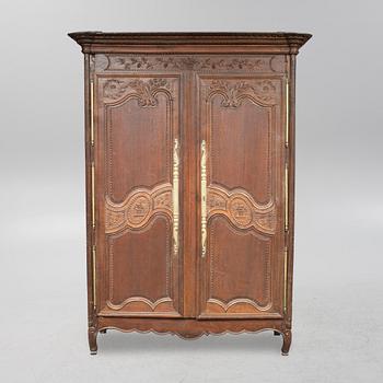 A french carved wooden cabinet, around 1900.