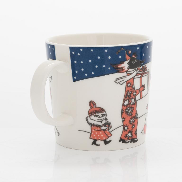 A Moomin Finnair 75 Anniversary mug, vitro porcelain, Moomin Characters, Arabia, Finland 1998.