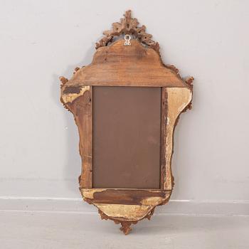 A pair of mid 20th century wood mirrors from Paoletti, Firenze Italy.