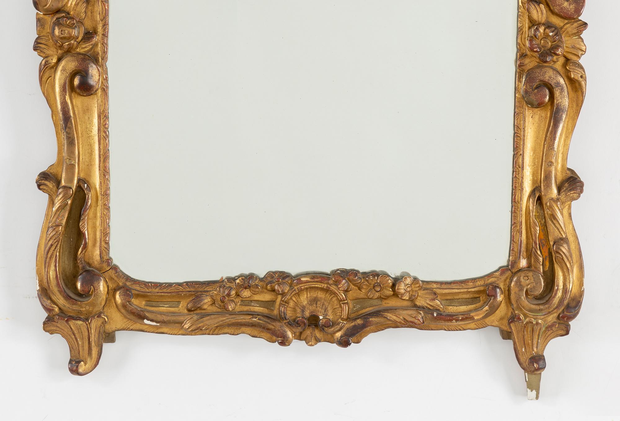 A 19th century Louis XV-style mirror.