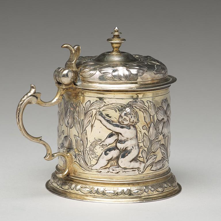 A German 17th century parcel-gilt silver tankard, mark of Hans Leonhard Huber, Augsburg (1637-1671).