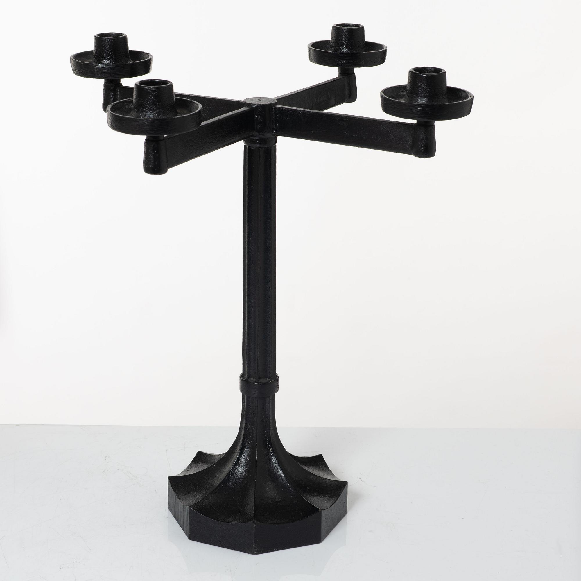 Sigurd Persson, a pair ofa cast iron candelabras, Kockums 1965.