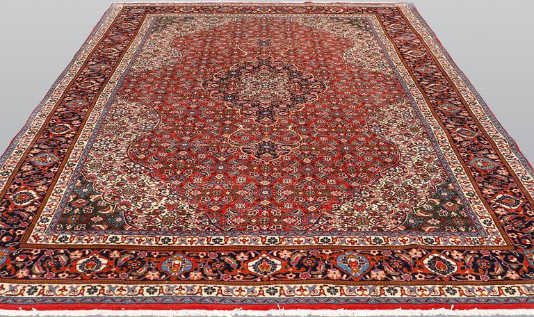 A Sarouk carpet, c 312 x 224 cm.